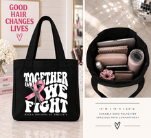 Load image into Gallery viewer, Together We Fight black tote with a view of everyday essentials inside and bag dimensions
